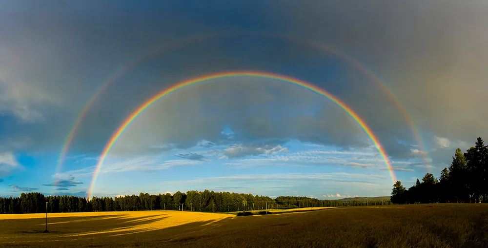 Landscape with large double rainbow